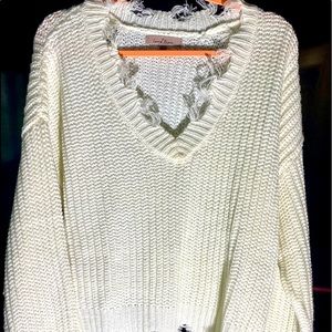 Popular frayed v-neck sweater